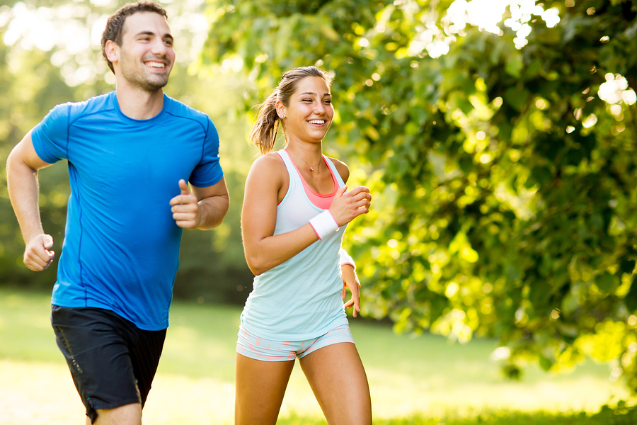 bigstock-Young-Couple-Running-94493951